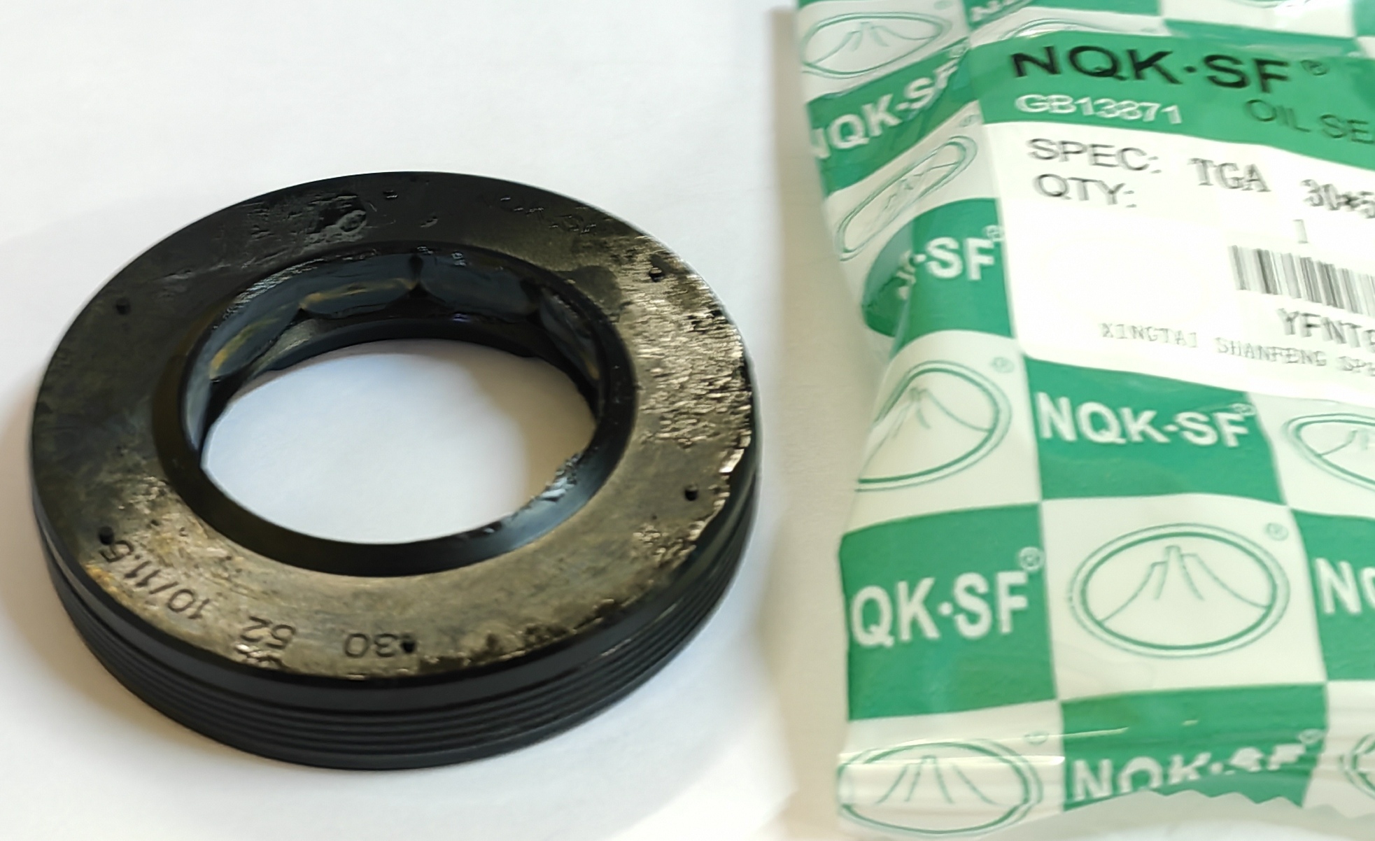 Сальник 30х52х10/12 NQK +смазка Indesit, Ariston, 417478, Zanussi 50095515008